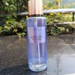 Victoria's Secret Midnight Bloom Fragrance Mist body spray bottle with a long-lasting floral fragrance