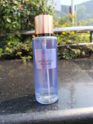 Victoria's Secret Midnight Bloom Fragrance Mist body spray bottle with a long-lasting floral fragrance